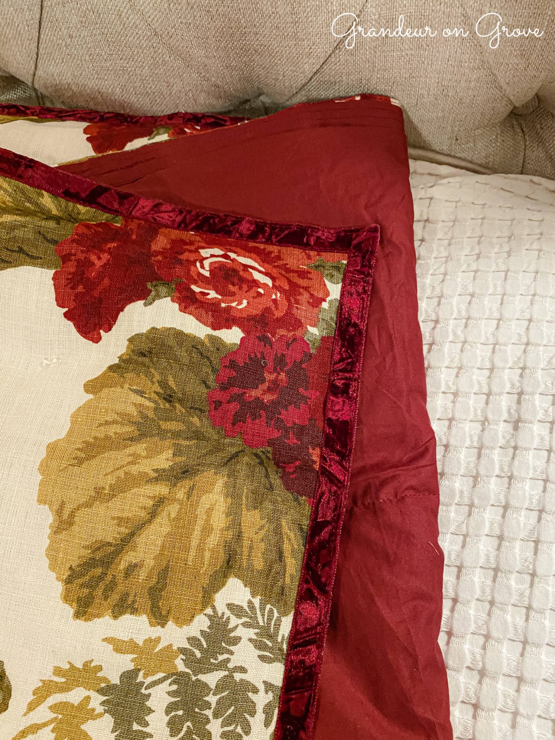 Velvet trim on the edge of red quilt
